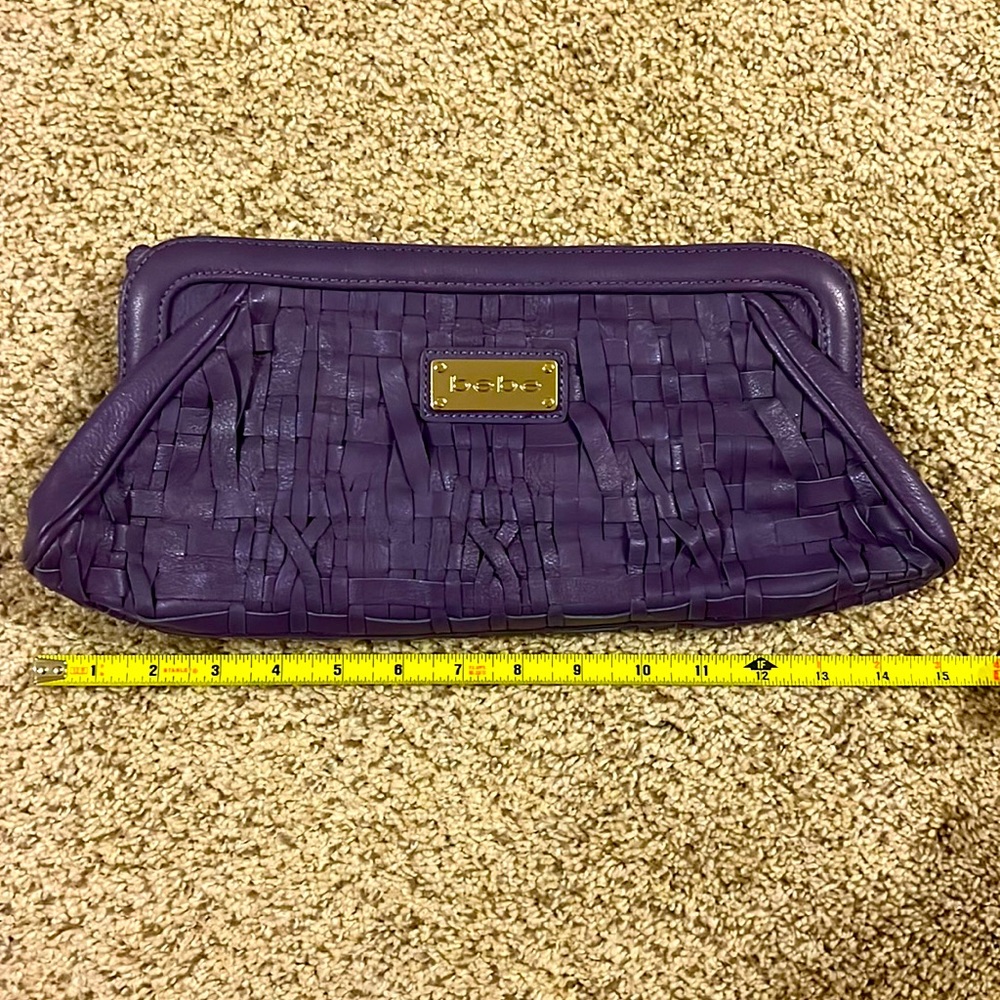 Bebe purple clutch gently used